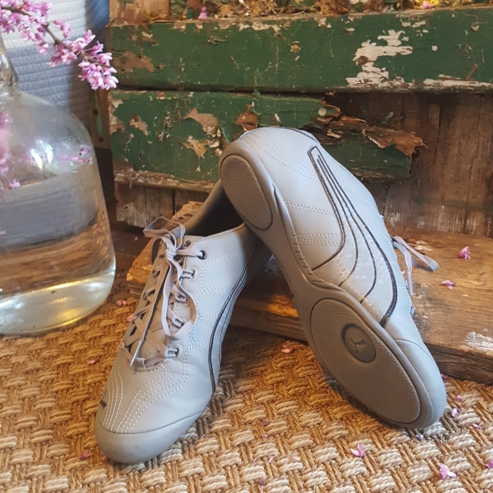 Puma brand tennis shoes. All grey. Size 8.5